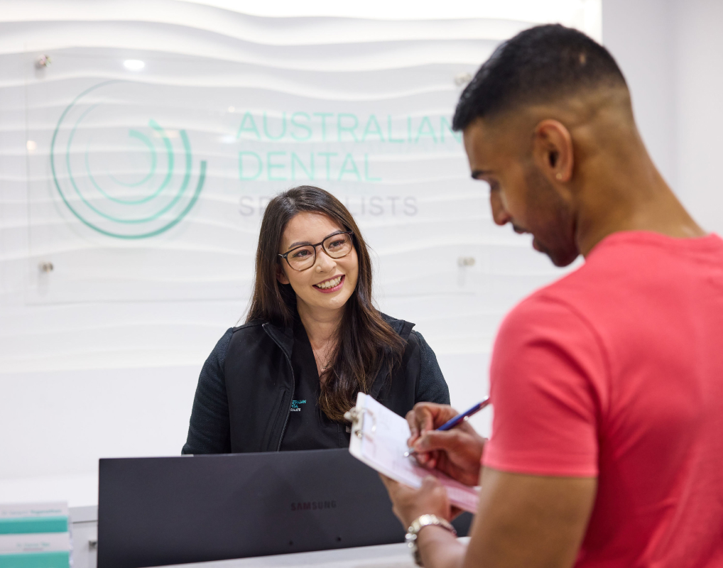 friendly reception at work | australian dental specialists