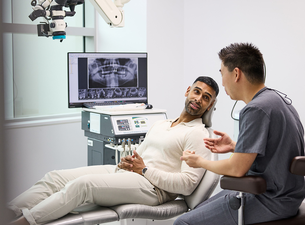dentist give advice in state of the art laboratory | Endodontist Clinic Sydney