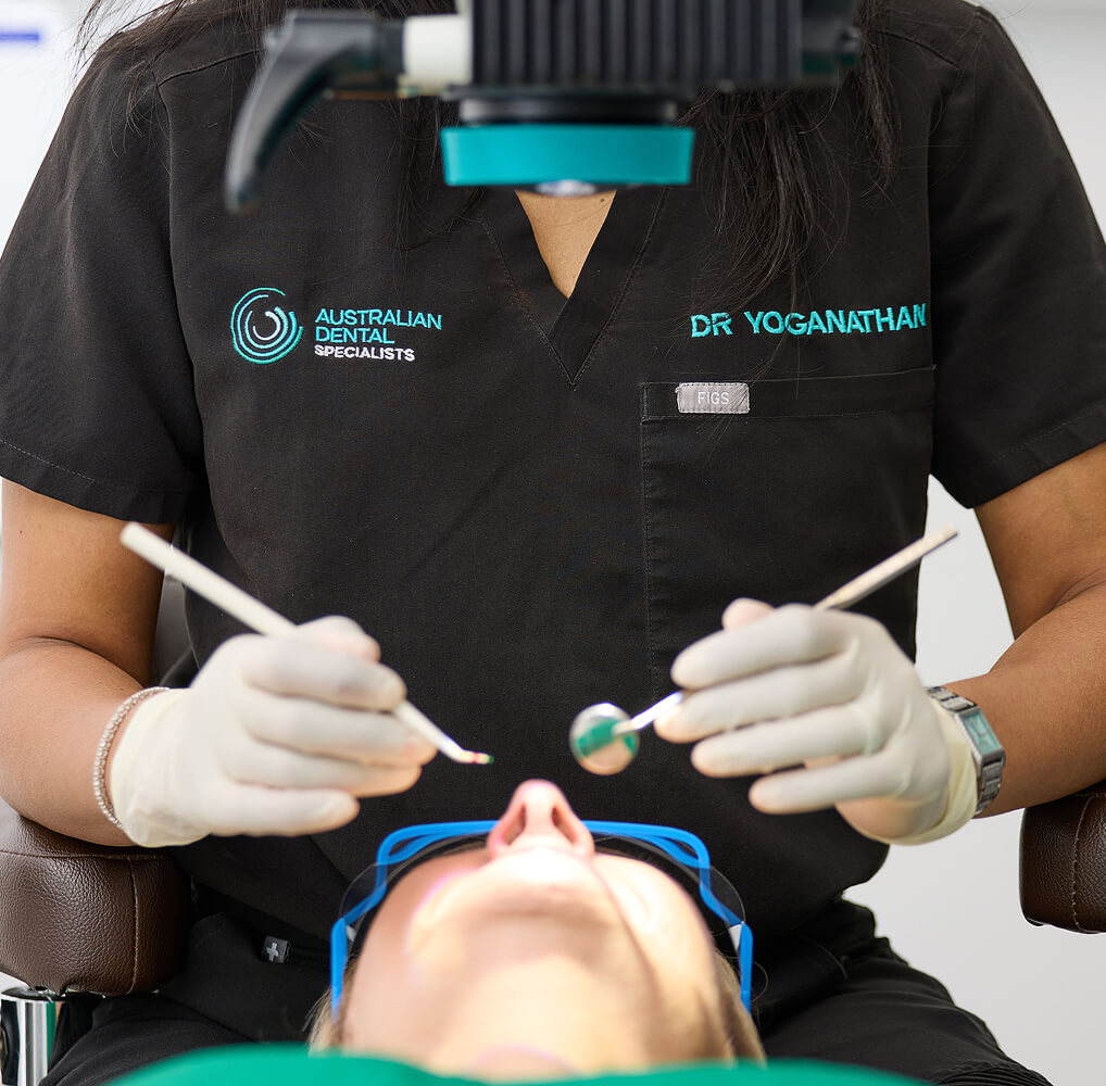 our dentists in action | Endodontist Clinic Sydney