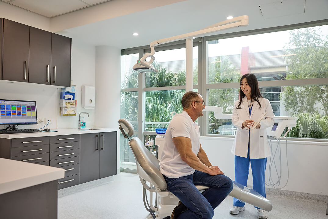 dentist give advice in state of the art laboratory | Endodontist Clinic Sydney